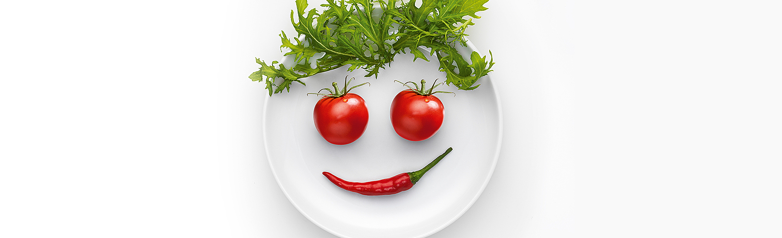 Lächelndes Gesicht aus Gemüse